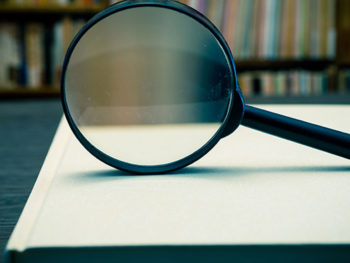 Magnifying Glass on Books